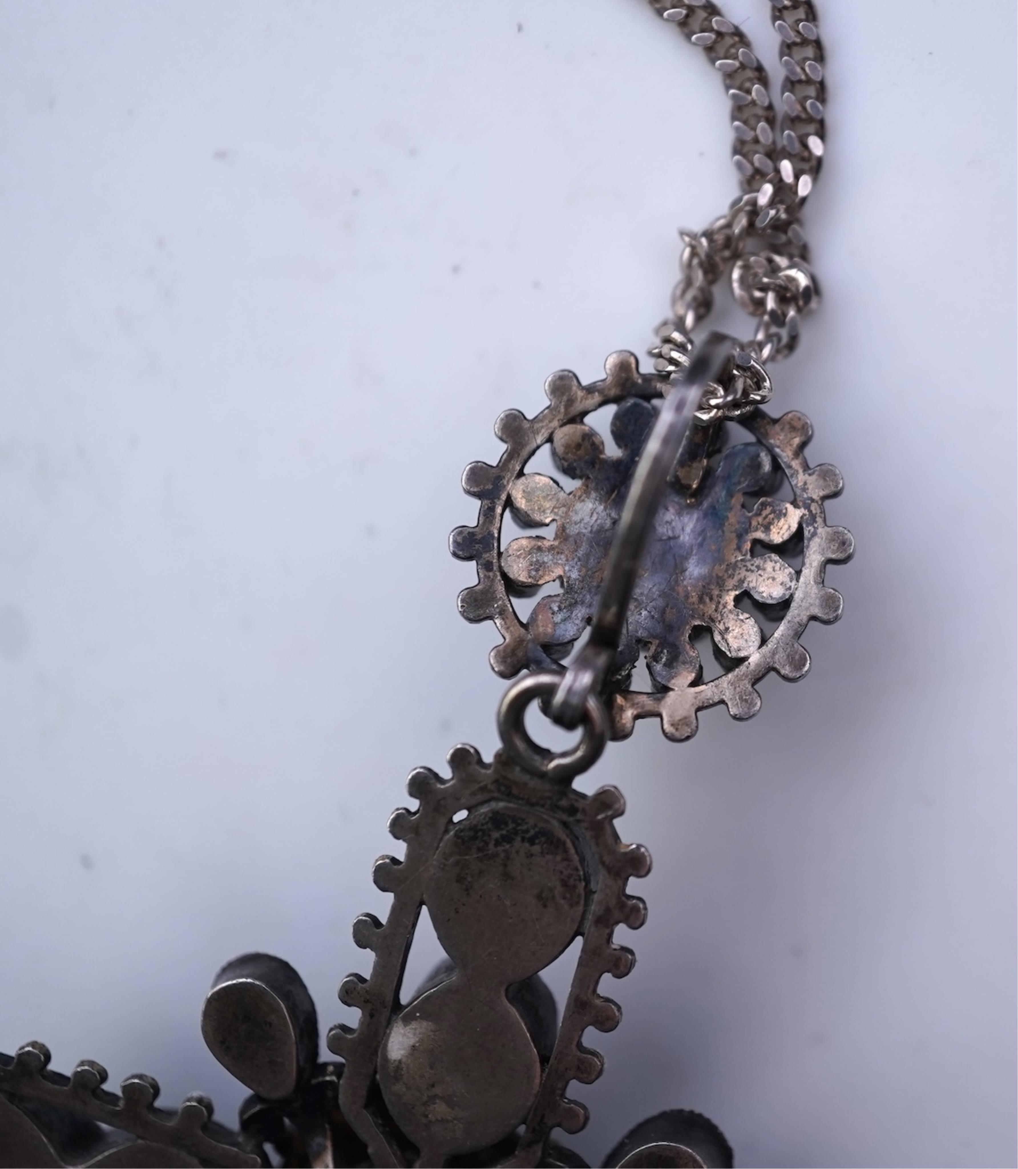 A Renaissance Revival enamel and garnet pendant, late 19th century